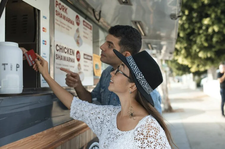 Customers ordering at a food truck